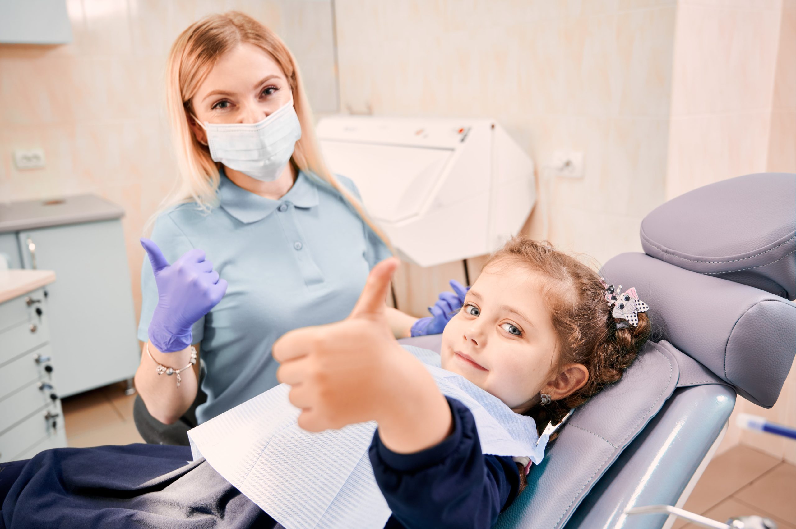 Dental Check up - Kensington Court Clinic - dentist and patient -benefits of having a dental check up